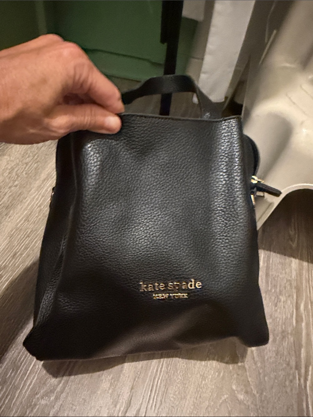 kate spade Black Pebbled Leather Mini Backpack with Gold Logo